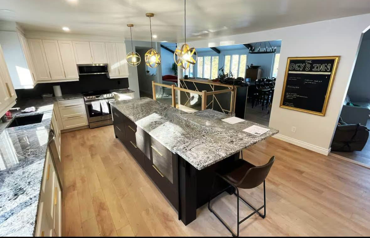 Open concept kitchen with pendant lighting